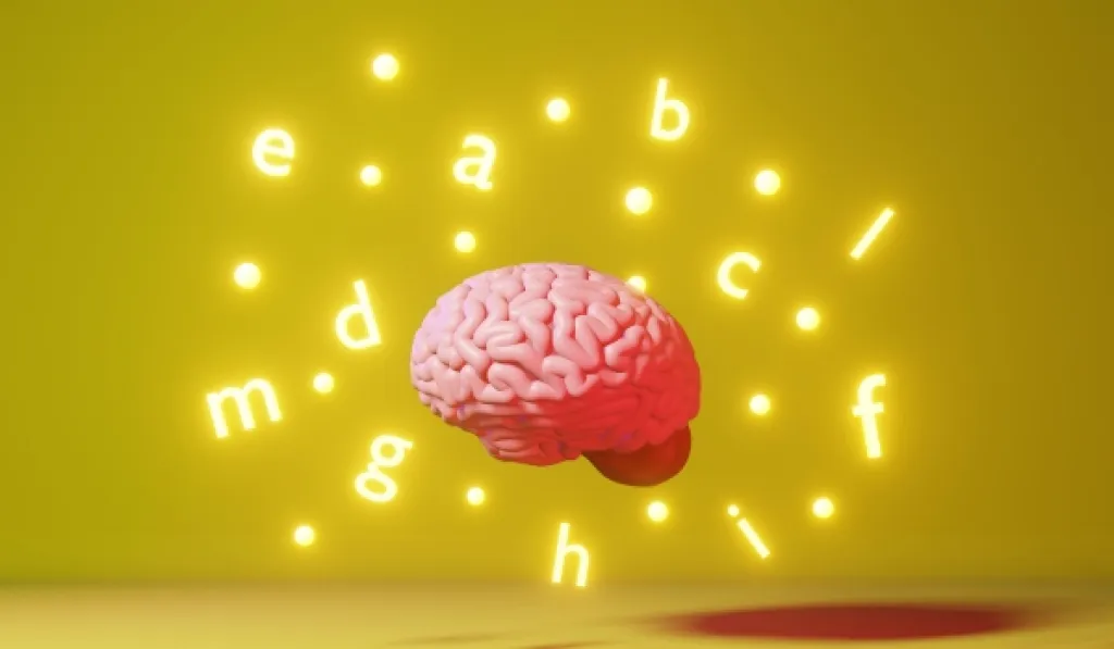 Pink brain with glowing letters on yellow background.
